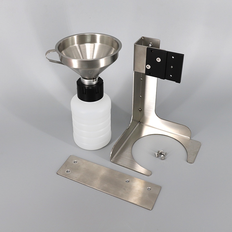 Domino Nozzle Cleaning Assembly